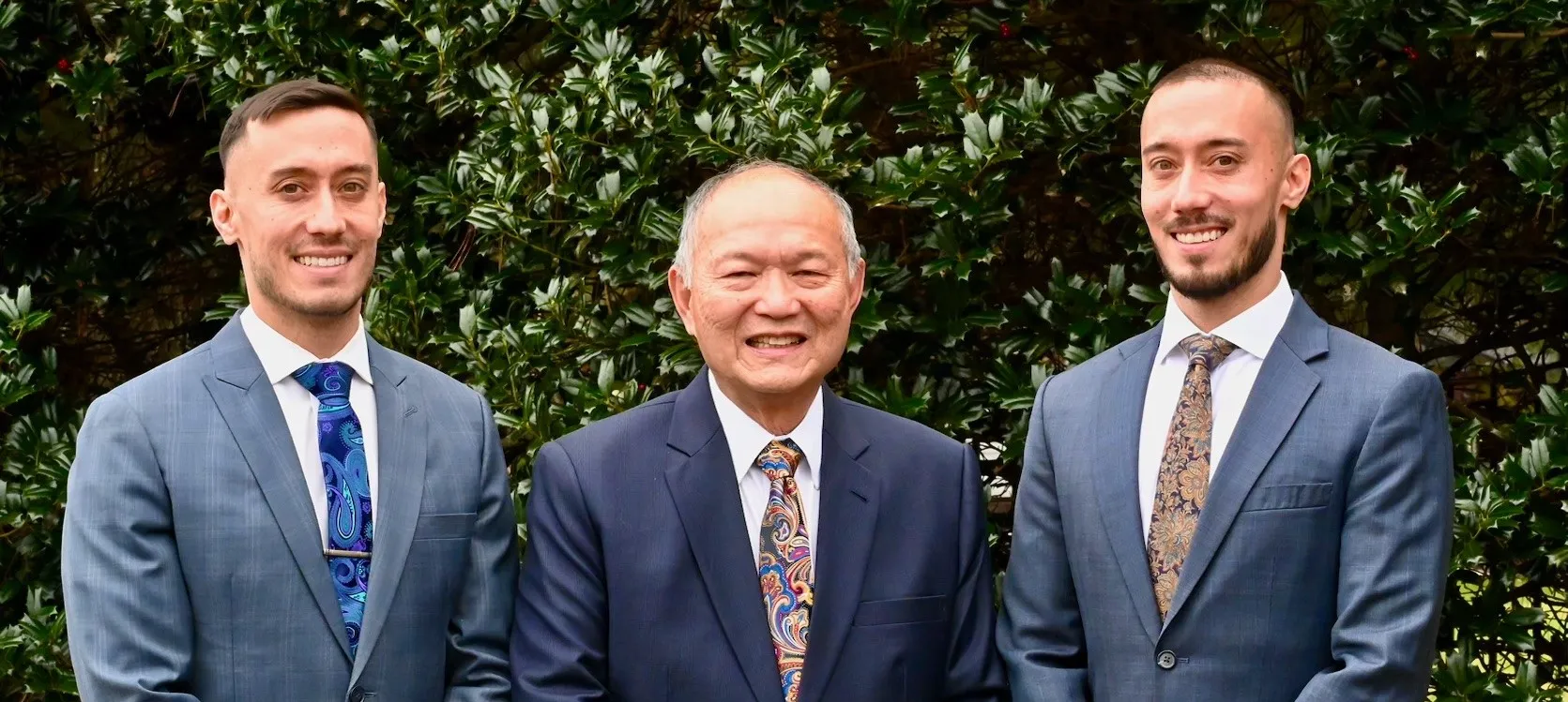 Dr. Henry Lee with his sons, Dr. Alex Lee and Dr. Justin Lee, of Twin Dentistry in Olney
